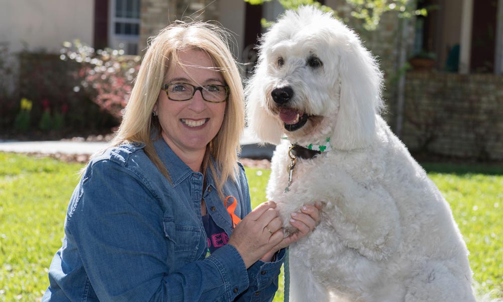 Dr. Wendy Rice with Milo the therapy dogs