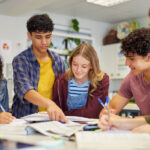 Teen with ADHD using a planner to organize homework and manage tasks